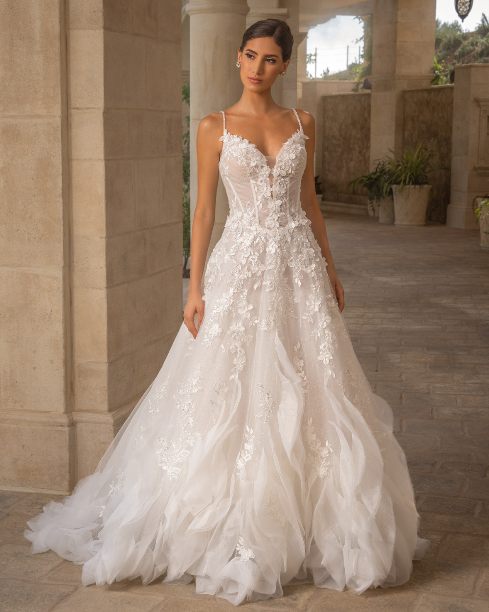 Model wearing a white A-Line Gown